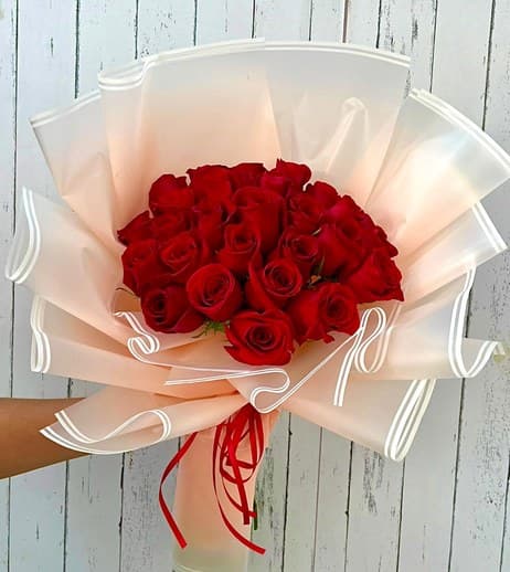 Wrapped red rose bouquet